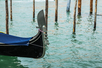 The bow of a gondola in the city of Venice, Italy.