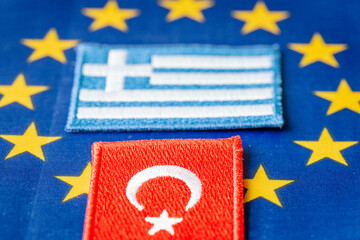 Symbols of Turkey as a candidate for the European Union and Greece as a member of the United...