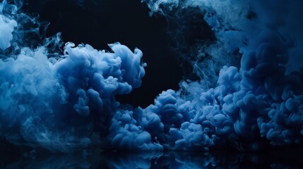 Blue smoke on black background