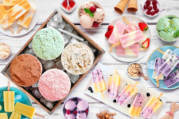 Cool summer food table scene. Collection of refreshing ice cream, popsicle and frozen treats....