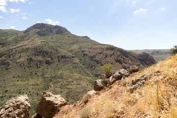 A Solitary Wanderer Descending the Rugged Armenian Mountainscape