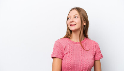 Obraz premium Young Russian woman isolated on white background thinking an idea while looking up