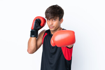 Young caucasian man isolated on white background with boxing gloves