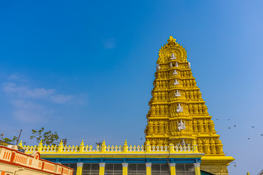 Chamundeshwari Temple is a Hindu temple located on the top of Chamundi Hills about 13 km from the palace city of Mysuru in the state of Karnataka in India. The temple was named after Chamundeshwari.	