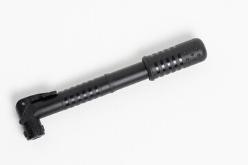 Bike pump closeup white background, view from above.