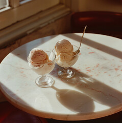 Ice cream on a table with sunlight