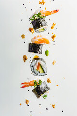 sushi flying through the air, white background, food photography, professional studio shot