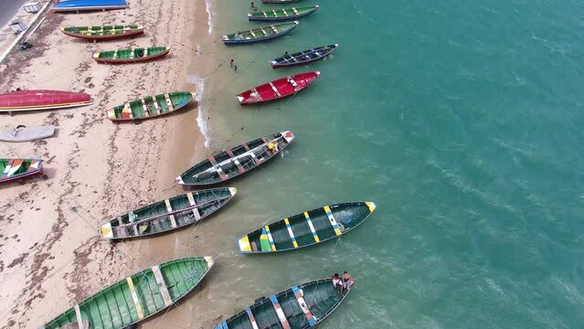 Fishing boats anchored on the banks of the Camocim river - Camocim, Cear&aacute;, Brazil