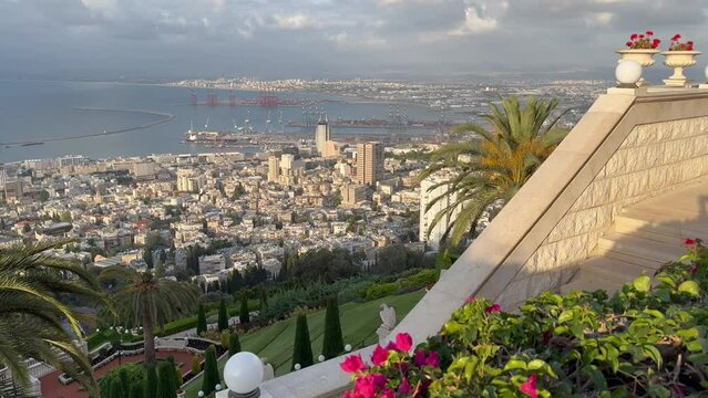 Haifa, Israel, June 26, 2024 : view from the Louis Promenade on Mount Carmel to the Bahai Temple, the downtown and port of Haifa city