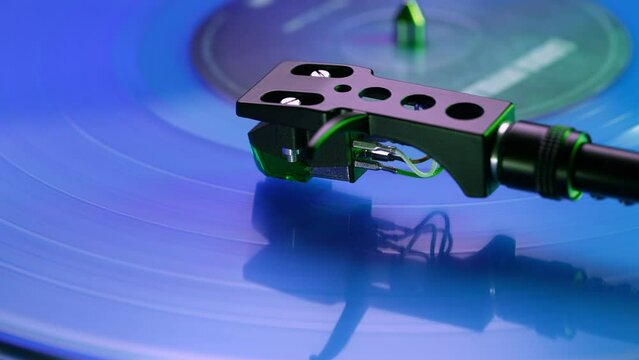 Vinyl disk DJ turntable record player. Rotating plate needle stylus, loop. Macro