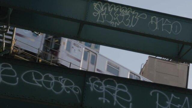 Handheld shot of the subway passing through Queens, New York City.