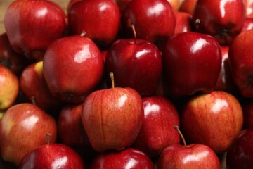 Fresh ripe red apples as background, closeup