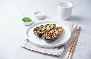 Teriyaki sesame seed baked eggplant in a plate