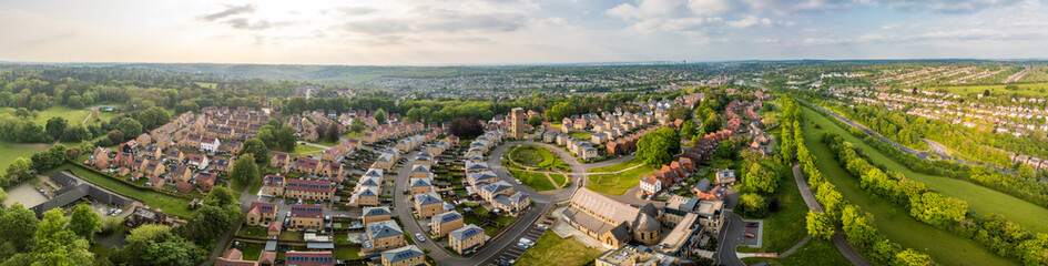 Aerial drone view of the Cane Hill area in Coulsdon, UK, with new houses and apartments.