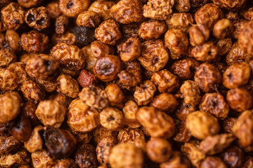 Orange tiger nuts wet with water and clean