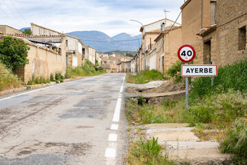 a paved road entering Ayerbe, comarca of Hoya de Huesca, province of Huesca, Aragon, Spain
