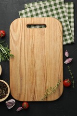 Cutting board, fresh tomatoes and different spices on grey textured table, flat lay