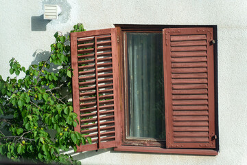 Faded Red  Elegance. The Weathered Charm of an Old Window glass Frame Covers. 