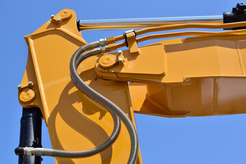 The yellow crane is a manipulator with a hydraulic cylinder. The working equipment of the...