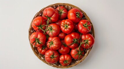 Basket full of ripe organic tomatoes, seen from above, isolated background, studio lighting capturing their rich red hues and natural details