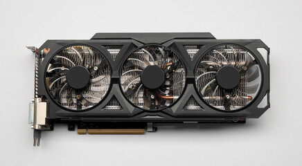One graphics card on color background, top view