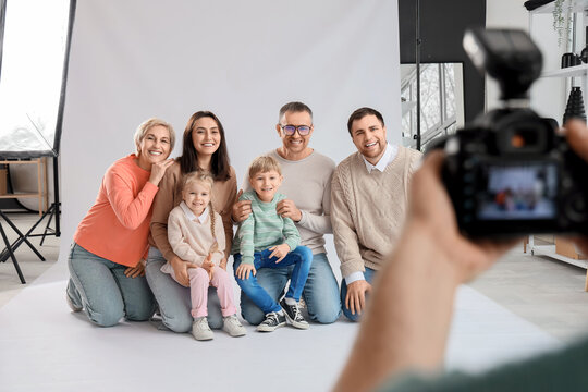 Big family having photo shoot in studio
