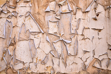 Old cracked paint texture on the wall.