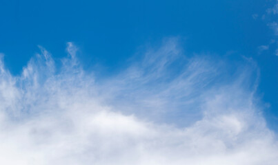 Large white clouds. Sky with fluffy white cloudscape texture. Wide blue sky nature background, cloudy, horizontal