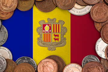 Coins on flag of Andorra . trading investment business currency concept