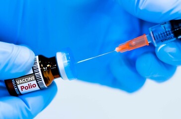 Vaccine bottles and syringes for preventing polio.