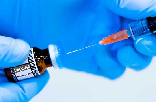 Pneumococcal vaccine bottles and syringes for preventing pneumonia.