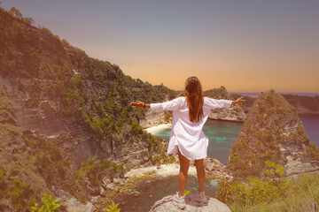 Naklejka premium Happy young woman lifestle as freedom mood at summer tropical beach concept