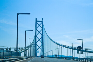 Drive on the Akashi Kaikyo Bridge, that's the world's longest suspension bridge, and connects Kobe town to Awaji Island.