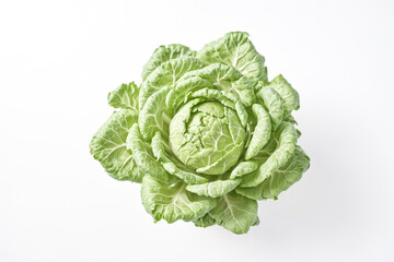 Obraz premium Close-up of a Fresh Green Cabbage Isolated on White