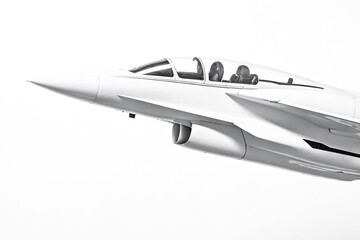 Black and White Photo of a Fighter Jet Soaring Through the Sky
