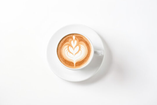Top view of a cup of cappuccino with latte art