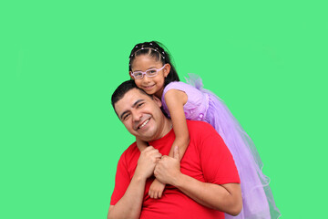 Divorced single dad plays with his brunette Latin daughter in a princess dress, they show their love and celebrate Father's Day with green screen