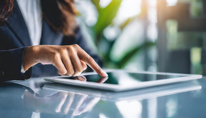 woman's hand holding digital tablet, finger pointing at screen, symbolizing modern business analysis technology