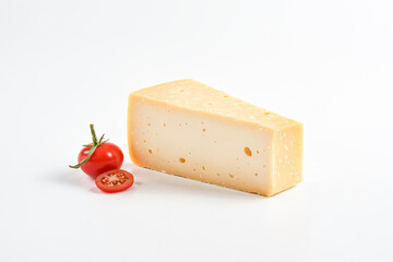 Closeup of a Wedge of Yellow Cheese and Tomatoes