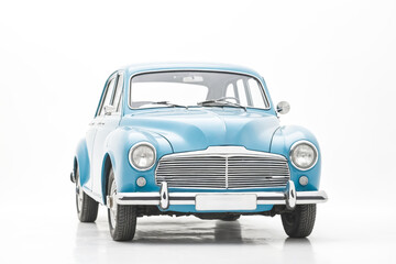 An old vintage car in blue color on a white background.