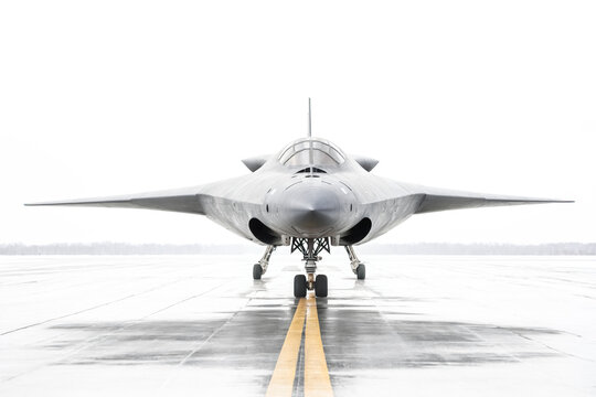 A black fighter on the landing strip.