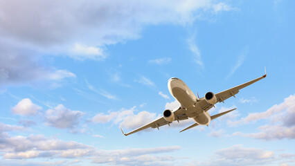 White passenger airplane flying in the sky amazing clouds in the background - Travel by air...