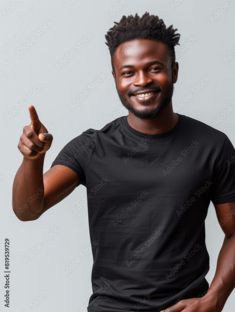 Poster A smiling african man in a black t - shirt pointing at something. Generative AI.