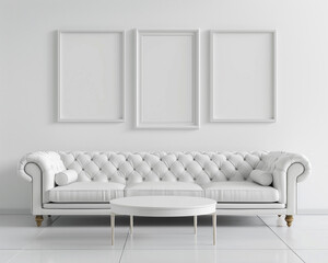 Modern minimalist space with three frames on a white wall, white leather sofa, and a low-profile white table.