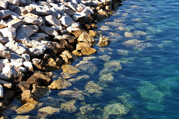 Closeup of beach stone and sea water