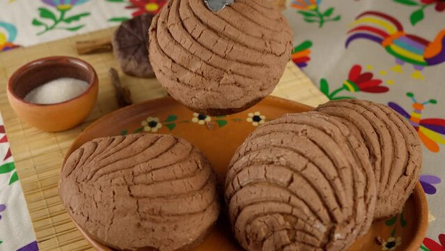 taking a chocolate shell and taking it to a clay plate