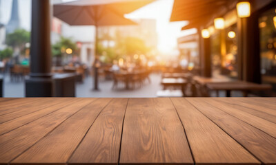 Empty wooden table top with lights bokeh on blur restaurant background. wooden table for product placement or montage with focus table top, outdoors bokeh background. Close up of wooden table in cafe