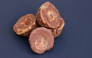 Date Palm Jaggery Heap or Khejur Gur Isolated on Black Background with Copy Space