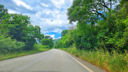 road street in louros river epirus greece, spring season