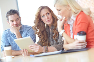 People, meeting and together with tablet in office for work, big idea or planning with problem solving. Small business and group with technology for web design, collaboration for company pitch